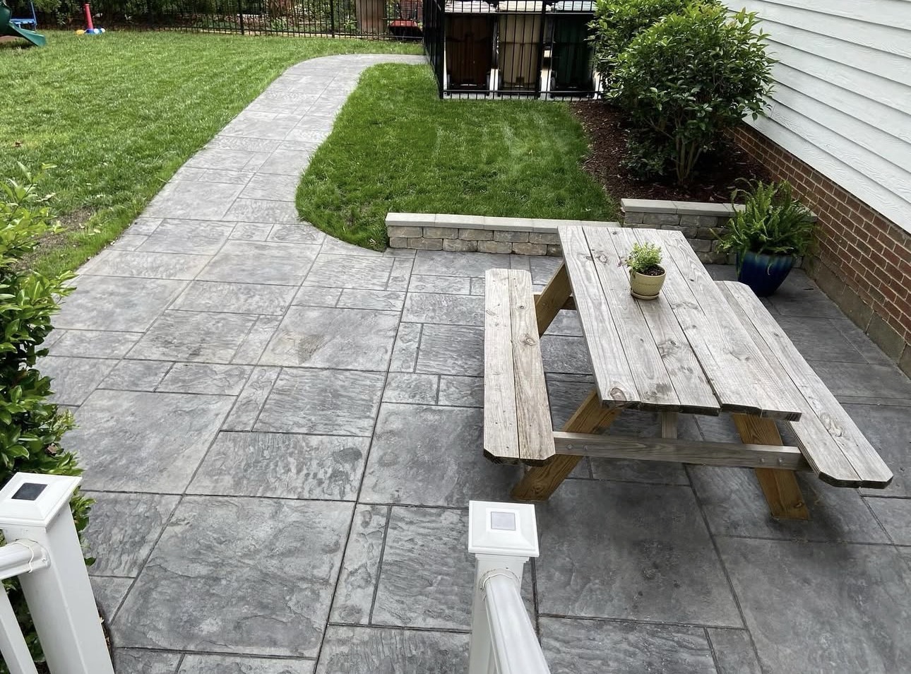 Stamped concrete patio with walkway